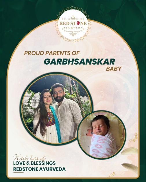 New parents holding newborn baby with blessings from Red Stone Ayurveda Garbhsanskar
